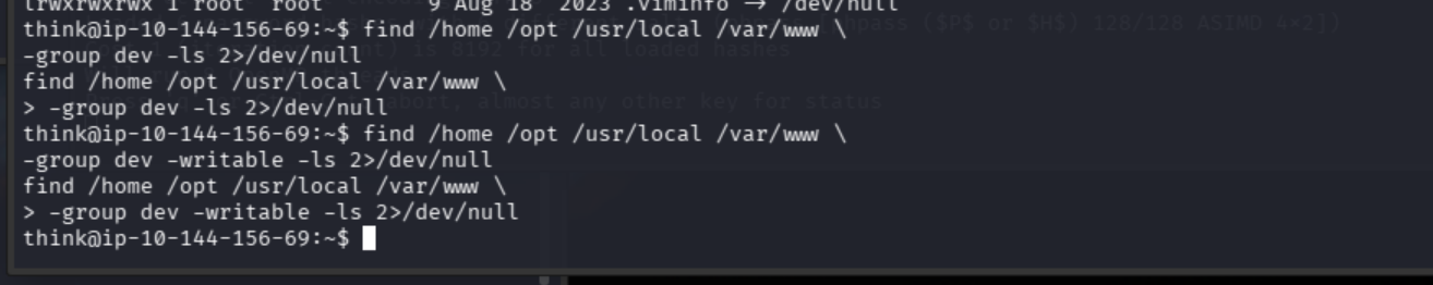 Search for files owned by or writable to the dev group